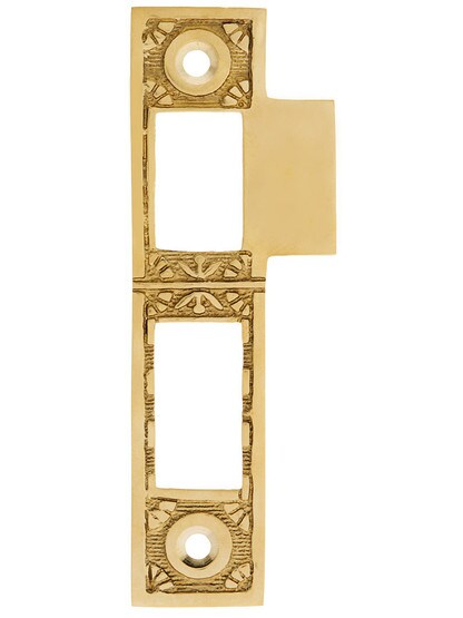 4 5/16 inch Solid Brass Windsor-Pattern Strike Plate In Un-Lacquered Brass.
